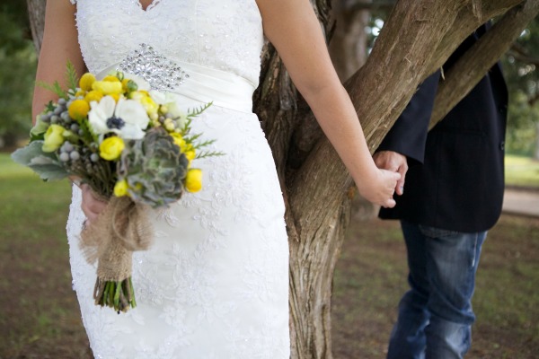wedding-inspiration-must-have-photo-bride-groom-holding-hands-secretly