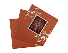 Orange and golden card with 3D ganesha design