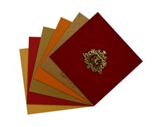 Designer Ganesha wedding card in Red velvet and antique golden