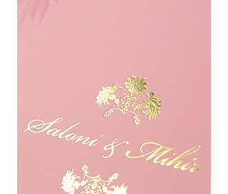 Baby pink multifaith indian wedding card with embossed floral design