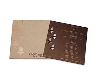 Beautiful laser cut wedding invite with temple bells