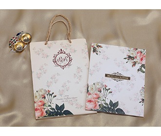 Beige Floral Indian wedding invitation in carry bag style