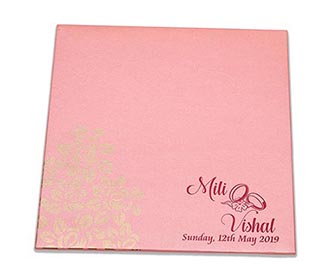 Cardboard wedding invite in pink color with laser cut birds