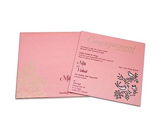 Cardboard wedding invite in pink color with laser cut birds