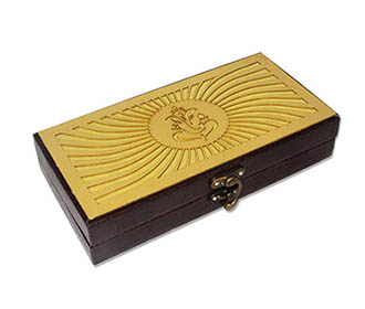 Cash box in brown rexine with laser cut ganesha