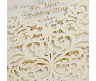 Indian wedding card wiith laser cut floral pocket in Ivory