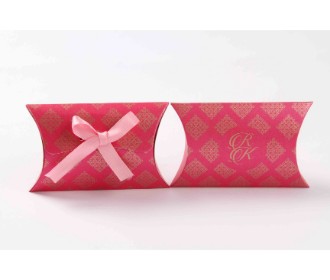 Clutch style party favour box in Pink color with printed initials and ribbon closure