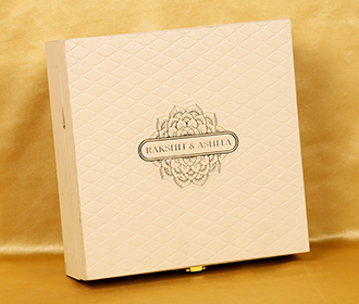 Cream colour Indian wedding box invite with designer inserts & sweet jars