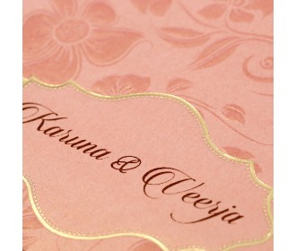 Designer floral wedding card in pastel pink colour