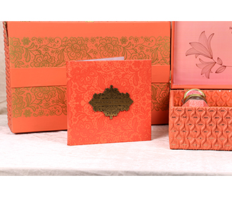 Designer Indian wedding box invite & sweet jars in pastel orange colors