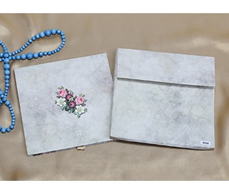 Designer Indian wedding invitation with floral patterns