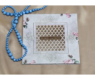 Designer Indian wedding invitation with floral patterns