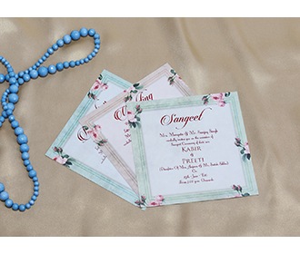 Designer Indian wedding invitation with floral patterns