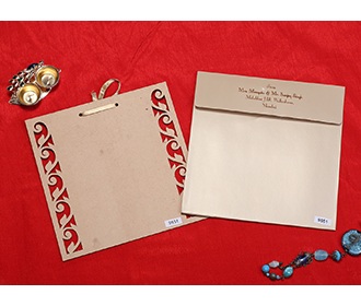 Designer wedding card in brown with laser cut cardboard style