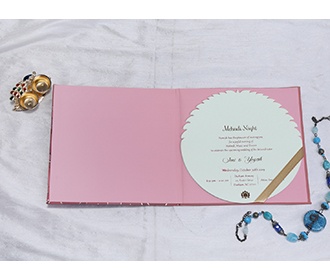 Designer wedding card in lotus petal design and circular inserts