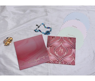 Designer wedding card in lotus petal design and circular inserts