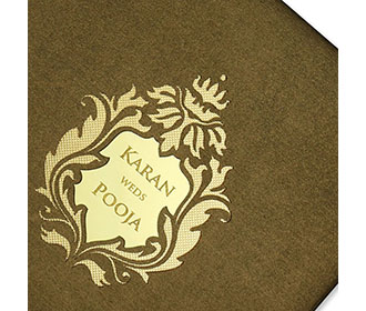 Designer wedding invitation in Brown with floral cut outs