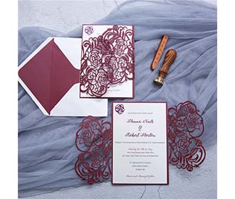Elegant rose themed laser cut wedding invitation in burgundy