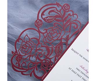 Elegant rose themed laser cut wedding invitation in burgundy