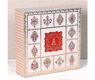 Ethnic Indian wedding invitation box with sweet jars