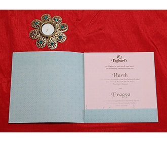 Floral Indian wedding invitation in powder blue colour
