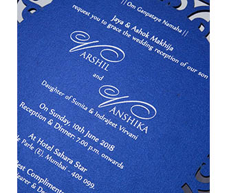 Floral motifs laser cut out wedding card in blue