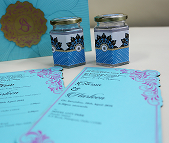 Floral theme wedding box invite in sky blue color with sweet jars