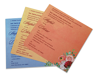 Floral wedding invite in pink with four fold envelope & a ribbon
