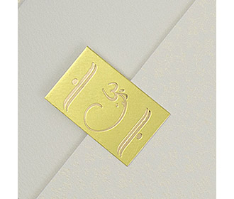Ganesha theme wedding invitation in Ivory with minimalistic design