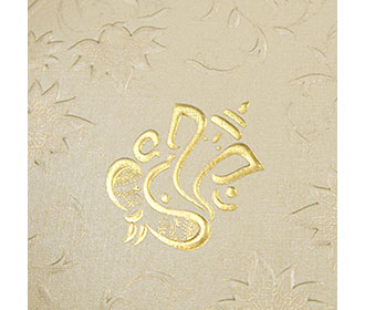 Ganesha themed floral wedding card in beige color