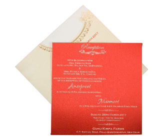 Ganesha Wedding invite in cream and red with cutout design