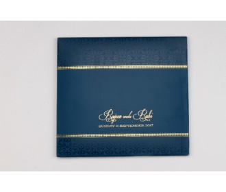Gatefold style midnight blue and gold card with a tassel opening