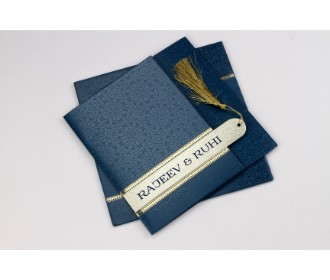 Gatefold style midnight blue and gold card with a tassel opening