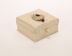 Ginni Box in Golden and Red Brooch Design
