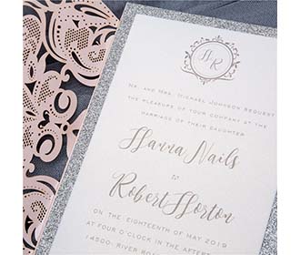 Gorgeous royal laser cut wedding invitation in metallic pink & silver