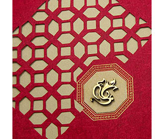 Greeting card style laser cut invite in red & golden