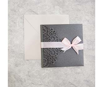 Grey shimmer laser cut wedding invitation with a pocket