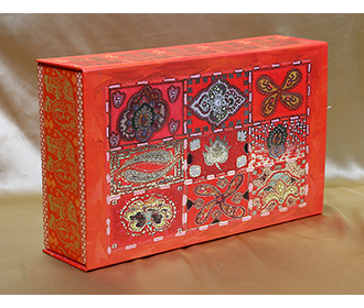 Indian wedding box card in red with motifs elephants and mirror shaped inserts