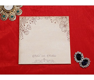 Indian wedding card in beige with embossed floral designs