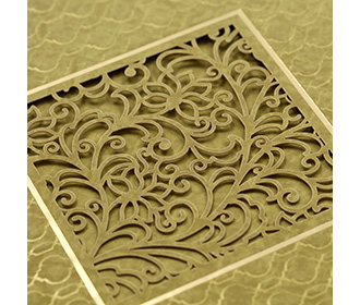 Indian wedding card in green embossed motifs and laser cut design