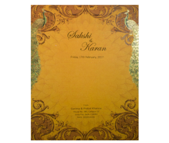 Indian wedding card in yellow with peacock designs