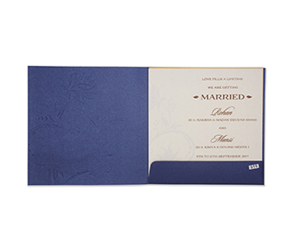 Indian wedding invitation in navy blue with embossed floral design