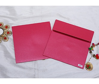 Indian wedding invitation in pink with designer motifs