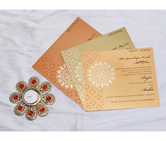 Indian wedding invitation in pink with designer motifs