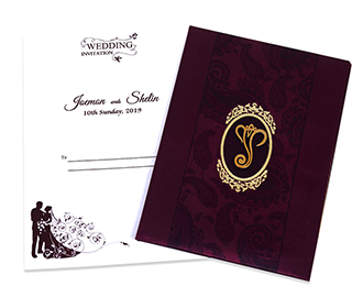Indian wedding invitation in purple satin with paisley design