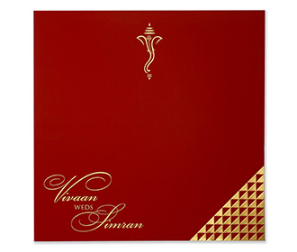 Indian wedding invitation in red with geometric patterns