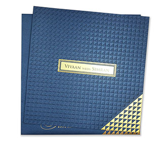 Indian wedding invitation in royal blue with geometric patterns
