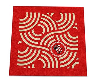 Indian wedding Invitation with circular geometric patterns in red