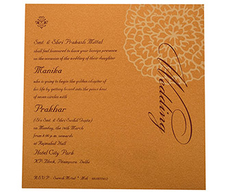 Indian wedding Invite in Pink with cut out golden Floral pattern