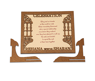 Invitation in laser cut photo frame style with the couple name